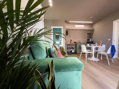 Area soggiorno di City Apartment Garibaldi