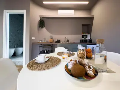 Cucina o angolo cottura di City Apartment Garibaldi