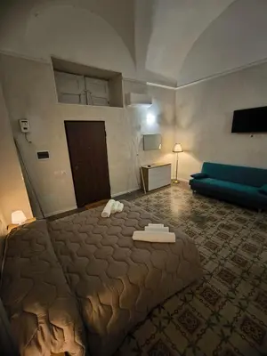 Letto o letti in una camera di Allegra House