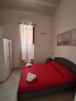 Letto o letti in una camera di Purtusu's House