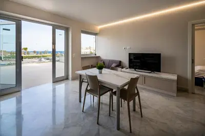 Area soggiorno di Campisi Luxury Apartments