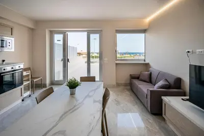 Area soggiorno di Campisi Luxury Apartments