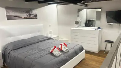 Letto o letti in una camera di Insight Loft