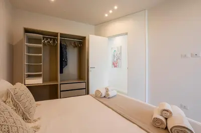 Letto o letti in una camera di ISULATRAVEL - Villa Nerissa