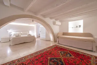 Letto o letti in una camera di Casa Scina'