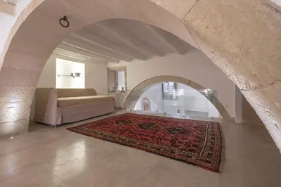 Letto o letti in una camera di Casa Scina'