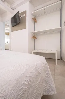 Letto o letti in una camera di Casa Scina'