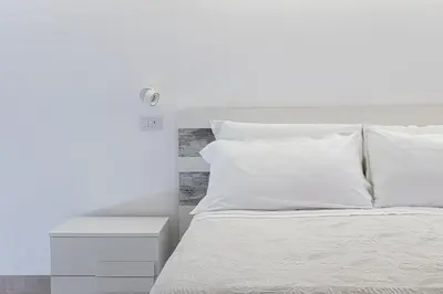 Letto o letti in una camera di Casa Scina'
