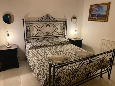 Letto o letti in una camera di Belvedere di Siracusa
