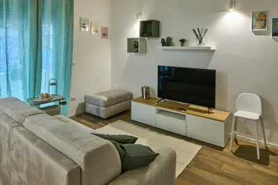 Area soggiorno di Melpomene e Talìa Casa Vacanze a Siracusa