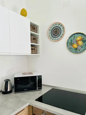 Cucina o angolo cottura di Casa Nereidi - Ortigia