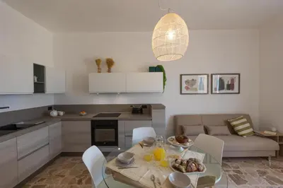 Cucina o angolo cottura di CENTRAL HOUSE palazzo Brafa appartamento con una camera da letto