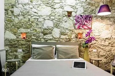 Letto o letti in una camera di B&B Siracusa
