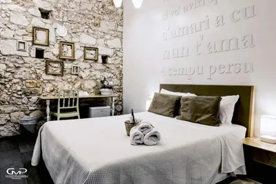 Letto o letti in una camera di B&B Siracusa