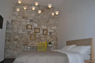 Letto o letti in una camera di B&B Siracusa