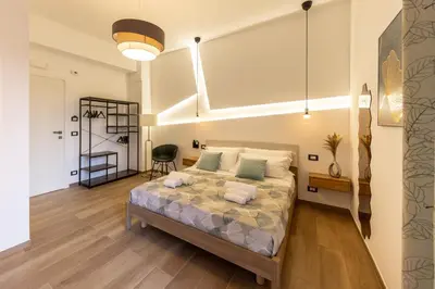 Letto o letti in una camera di Armony Luxury Suites