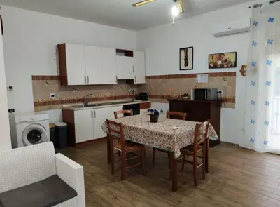 Cucina o angolo cottura di Bombana Beach - Vicino