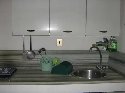 Cucina o angolo cottura di Carlo apartment in villa near the sea - wi-fi