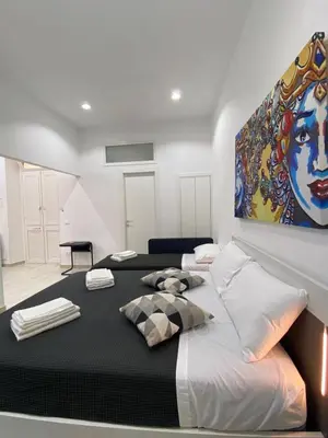 Letto o letti in una camera di Casa Ma Pì - relax e comfort nel centro di Augusta