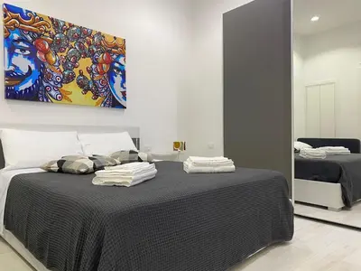 Letto o letti in una camera di Casa Ma Pì - relax e comfort nel centro di Augusta