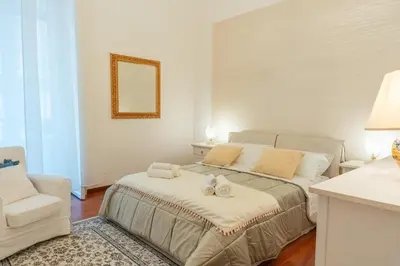 Letto o letti in una camera di Salotto Matteotti Luxury apartment