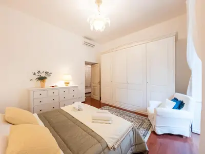 Letto o letti in una camera di Salotto Matteotti Luxury apartment