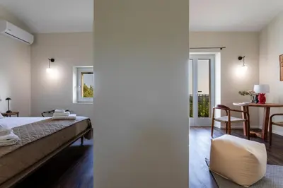 Letto o letti in una camera di Baglio La Corte - IsulaTravel