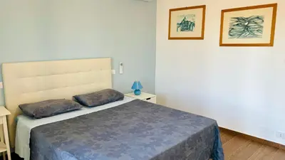Letto o letti in una camera di Villa sapore di mare 30 passi dalla spiaggia
