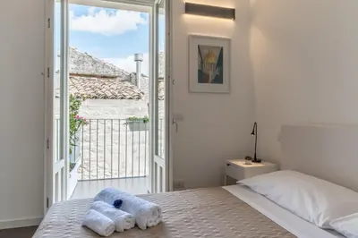 Letto o letti in una camera di Terrazza Dei Sogni