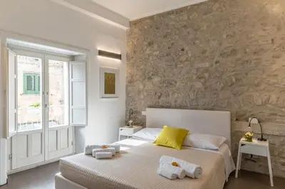 Letto o letti in una camera di Terrazza Dei Sogni
