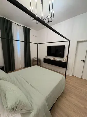Letto o letti in una camera di Nonna Ciccina House