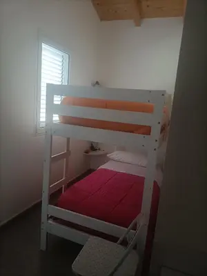 Letto o letti in una camera di airportandbeachhouse