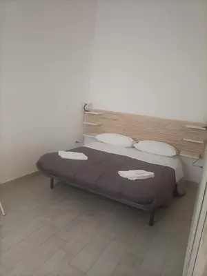 Letto o letti in una camera di airportandbeachhouse