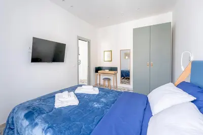 Letto o letti in una camera di Eos Serenity Suites