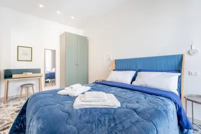 Letto o letti in una camera di Eos Serenity Suites