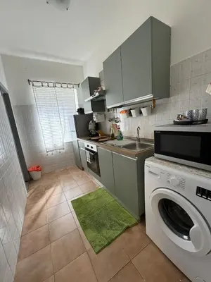 Cucina o angolo cottura di Chez Elle - Casa Vacanze due Camere Catania Centro