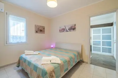 Letto o letti in una camera di Villa Carla San Lorenzo