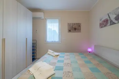 Letto o letti in una camera di Villa Carla San Lorenzo
