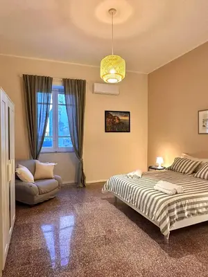 Letto o letti in una camera di Cortiletto Eveneto