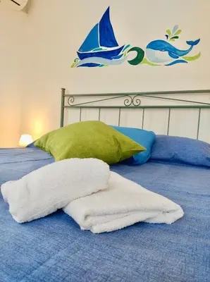Letto o letti in una camera di A' Riva Marzamemi