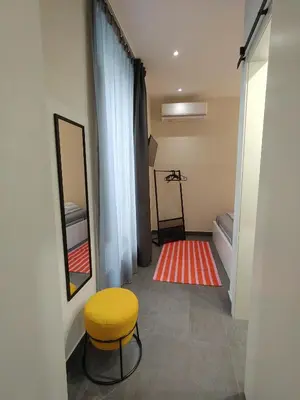 Letto o letti in una camera di Le Casette appartamento piano terra
