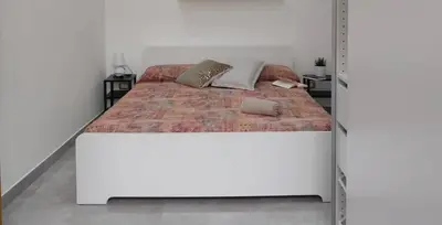 Letto o letti in una camera di casa di Igor
