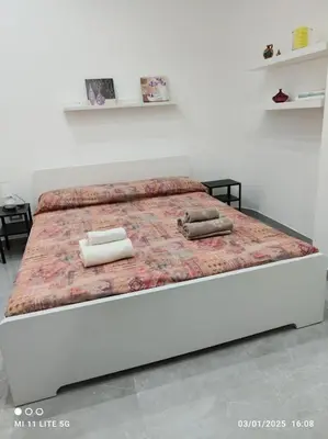 Letto o letti in una camera di casa di Igor