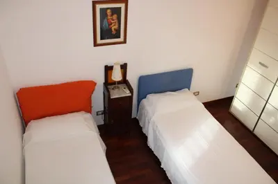 Letto o letti in una camera di Domus Aretusa