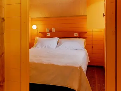 Letto o letti in una camera di Braccialieri Luxury Resort