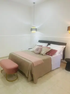 Letto o letti in una camera di Adama Boutique Home