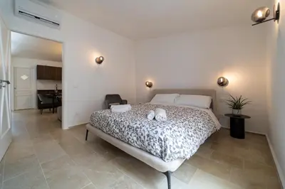 Letto o letti in una camera di GuestHost - Stylish Flat in Historic Ortigia