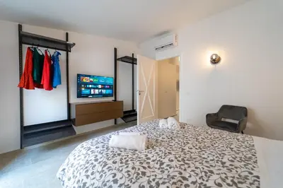 Letto o letti in una camera di GuestHost - Stylish Flat in Historic Ortigia