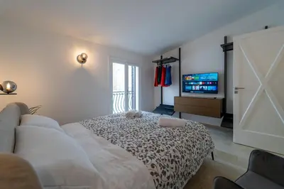 Letto o letti in una camera di GuestHost - Stylish Flat in Historic Ortigia