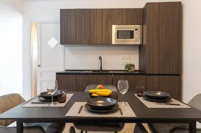 Cucina o angolo cottura di GuestHost - Stylish Flat in Historic Ortigia